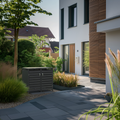Ecoscape Double Bin Storage with Lid in Charcoal in an outdoor setting