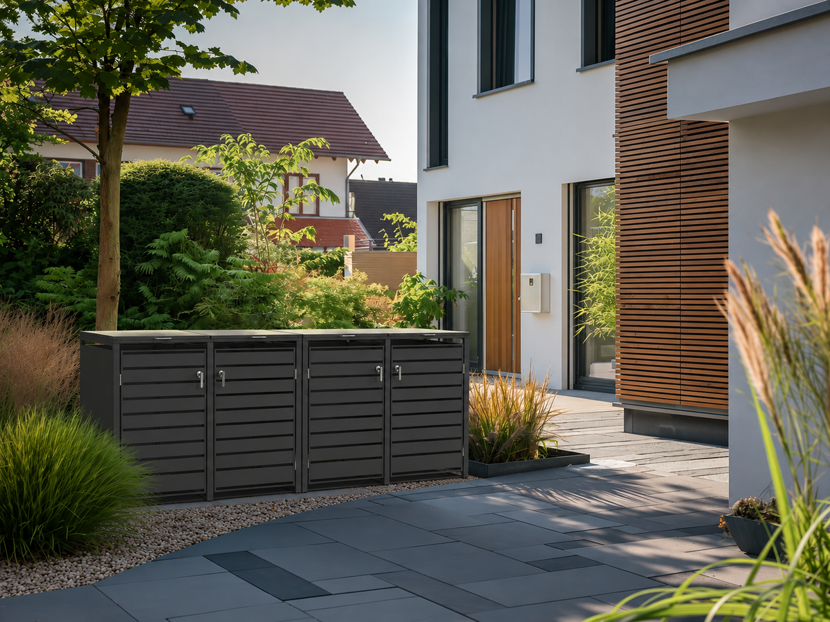 Ecoscape Quadruple Bin Storage with Lid in Charcoal in an outdoor setting